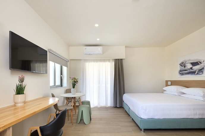 Imagen de la habitación del Villaggio Mare Suites. Foto 4