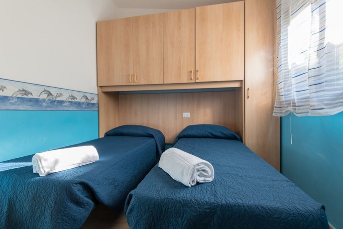 Imagen de la habitación del Villaggio Mare Verde. Foto 13