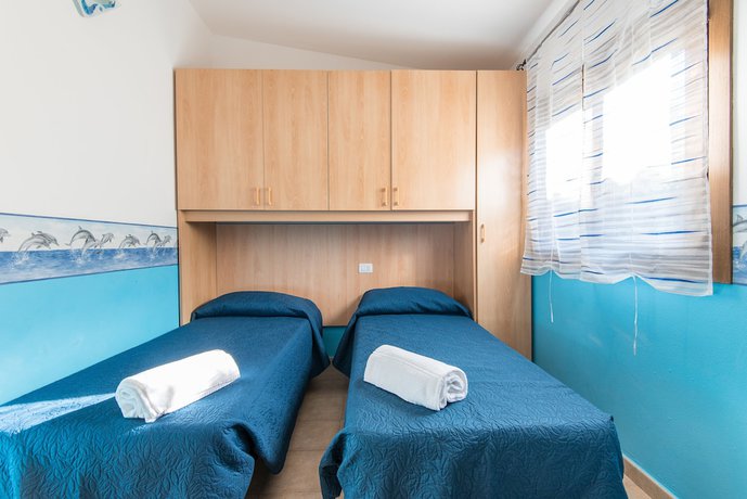 Imagen de la habitación del Villaggio Mare Verde. Foto 16