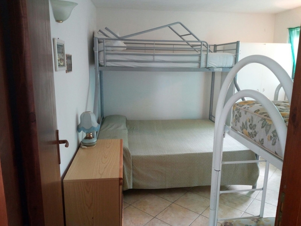 Imagen de la habitación del Villaggio Mediterraneo. Foto 9