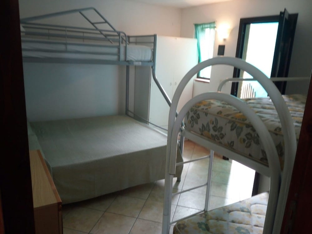 Imagen de la habitación del Villaggio Mediterraneo. Foto 10