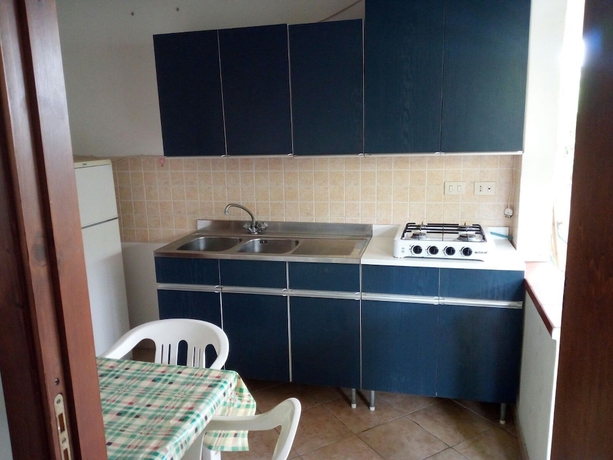 Imagen de la habitación del Villaggio Mediterraneo. Foto 12