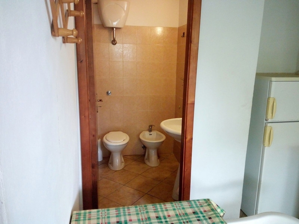 Imagen de la habitación del Villaggio Mediterraneo. Foto 14