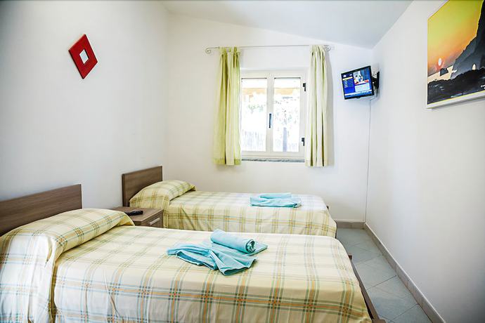 Imagen de la habitación del Villaggio Residence Torre Saracena - Campsite. Foto 17