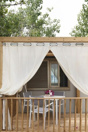 Imagen de la habitación del Villaggio Riva Del Sol. Foto 11