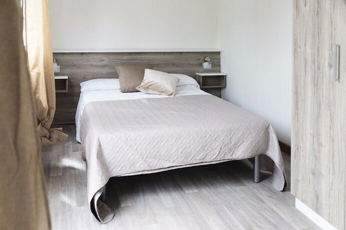 Imagen de la habitación del Villaggio Riva Del Sol. Foto 15