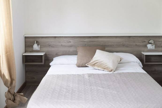 Imagen de la habitación del Villaggio Riva Del Sol. Foto 16