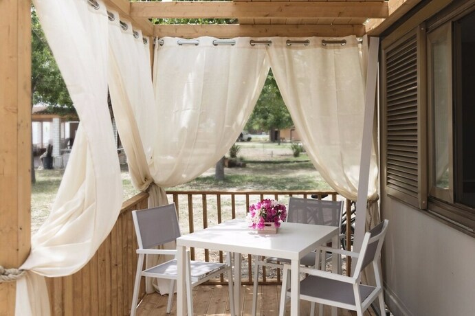 Imagen de la habitación del Villaggio Riva Del Sol. Foto 18