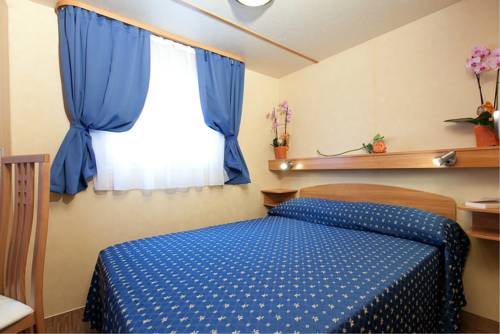 Imagen de la habitación del Villaggio Turistico Internazionale. Foto 16