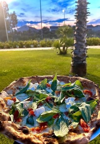 Imagen del bar/restaurante del Villaggio le Palatine. Foto 6