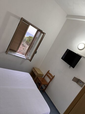 Imagen de la habitación del Villagio Camping La Scogliera. Foto 11