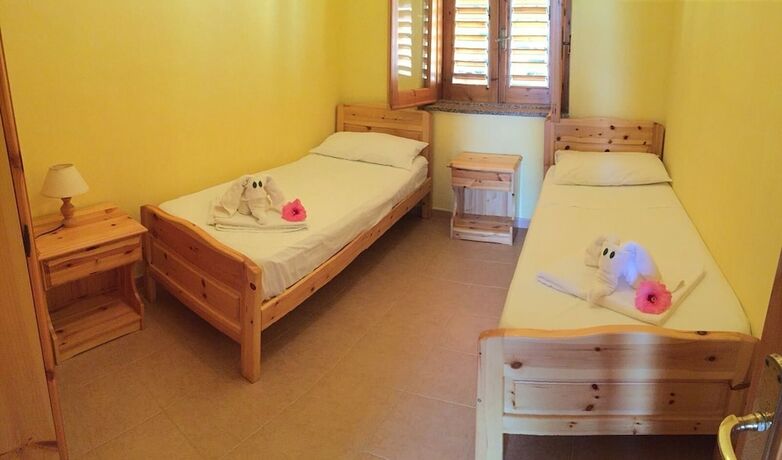 Imagen de la habitación del Villagio Camping La Scogliera. Foto 13