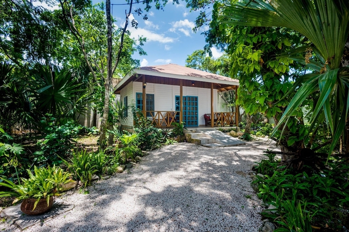 Imagen de la habitación del Villas El Encanto Cozumel. Foto 4
