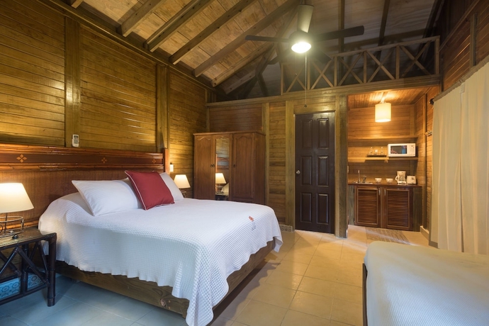 Imagen de la habitación del Villas El Encanto Cozumel. Foto 5