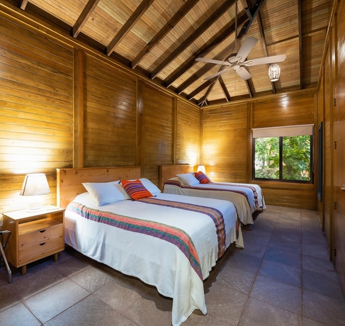Imagen de la habitación del Villas El Encanto Cozumel. Foto 9