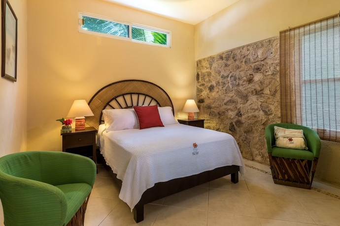 Imagen de la habitación del Villas El Encanto Cozumel. Foto 10