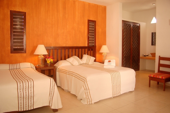 Imagen de la habitación del Villas El Encanto Cozumel. Foto 12