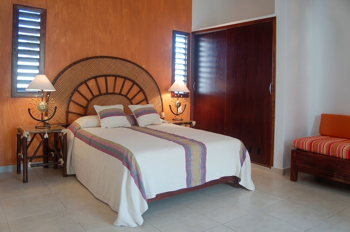 Imagen de la habitación del Villas El Encanto Cozumel. Foto 13