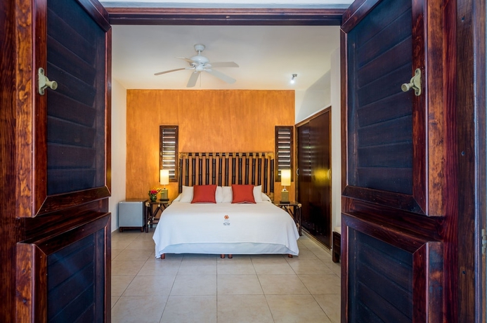 Imagen de la habitación del Villas El Encanto Cozumel. Foto 14