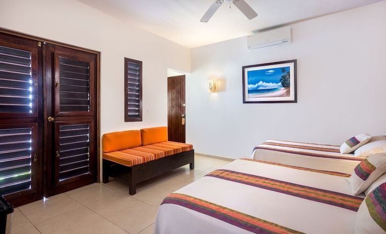 Imagen de la habitación del Villas El Encanto Cozumel. Foto 15