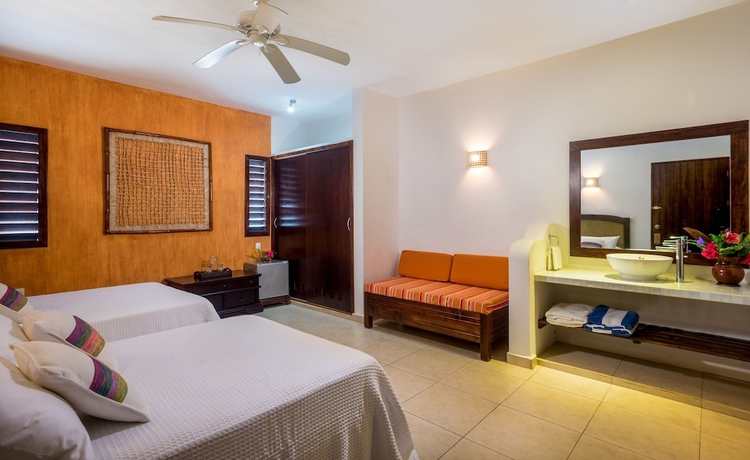 Imagen de la habitación del Villas El Encanto Cozumel. Foto 16