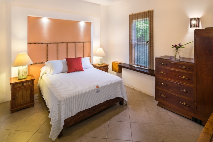 Imagen de la habitación del Villas El Encanto Cozumel. Foto 17