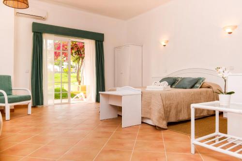 Imagen de la habitación del Villas Rufino. Foto 19