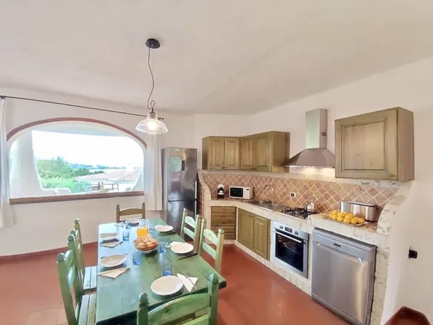 Imagen de la habitación del Ville vista mare a Porto Cervo. Foto 1