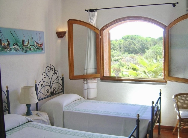 Imagen de la habitación del Ville vista mare a Porto Cervo. Foto 2