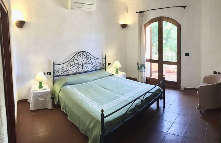 Imagen de la habitación del Ville vista mare a Porto Cervo. Foto 5