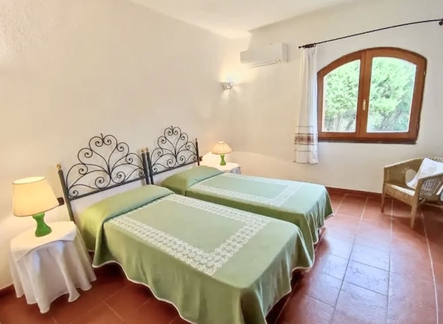 Imagen de la habitación del Ville vista mare a Porto Cervo. Foto 6