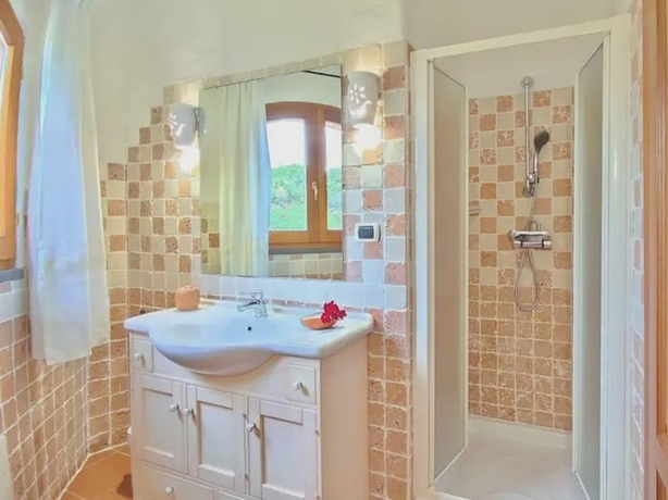 Imagen de la habitación del Ville vista mare a Porto Cervo. Foto 11