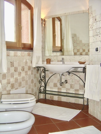 Imagen de la habitación del Ville vista mare a Porto Cervo. Foto 12