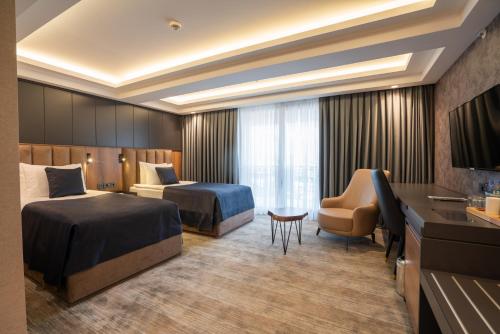 Imagen de la habitación del Vindula Hotel & Spa. Foto 19