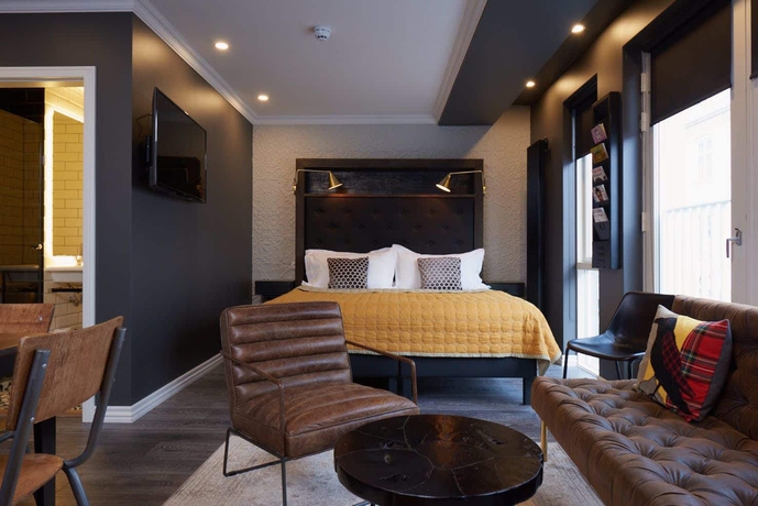 Imagen de la habitación del Vintage Hotel Apartments. Foto 16