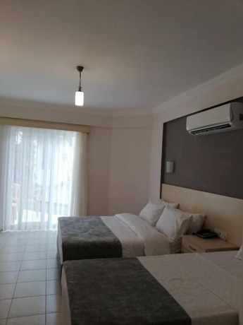 Imagen de la habitación del Viras Hotel. Foto 19