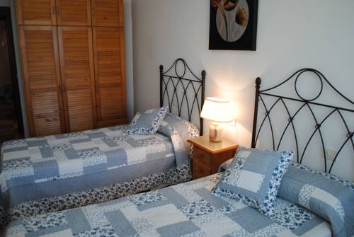 Imagen de la habitación del Viviendas Vacacionales Los Delfines. Foto 12