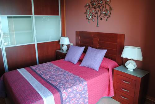 Imagen de la habitación del Viviendas Vacacionales Los Delfines. Foto 13