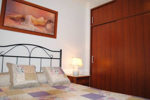Imagen de la habitación del Viviendas Vacacionales Los Delfines. Foto 14