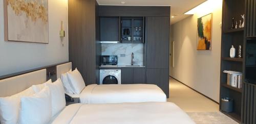 Imagen de la habitación del WAVEM HOTEL East. Foto 15
