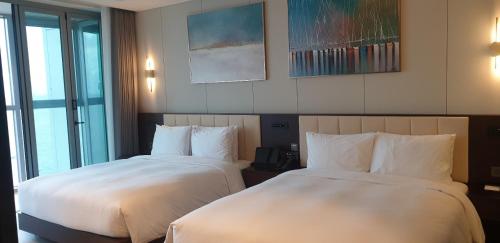 Imagen de la habitación del WAVEM HOTEL East. Foto 16