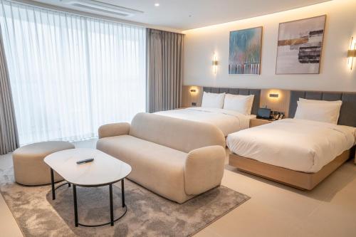 Imagen de la habitación del WAVEM HOTEL west. Foto 14