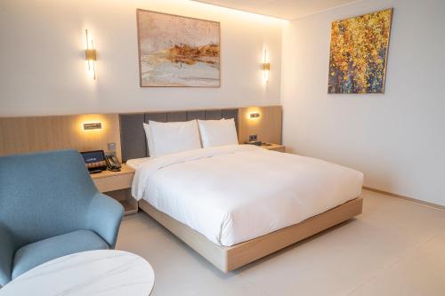 Imagen de la habitación del WAVEM HOTEL west. Foto 15