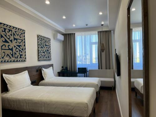 Imagen de la habitación del WEST INN Akjola Hotel. Foto 19