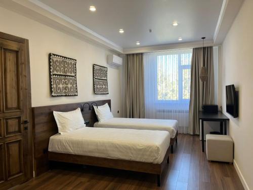 Imagen de la habitación del WEST INN Akjola Hotel. Foto 20