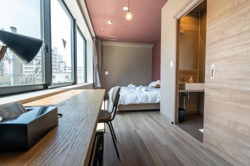 Imagen de la habitación del WISE OWL HOSTELS SAPPORO. Foto 13