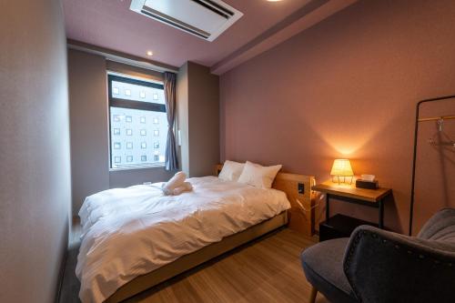 Imagen de la habitación del WISE OWL HOSTELS SAPPORO. Foto 17