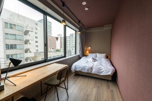 Imagen de la habitación del WISE OWL HOSTELS SAPPORO. Foto 18