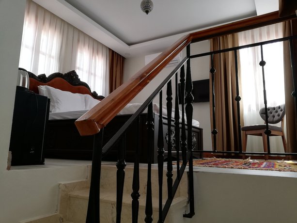 Imagen de la habitación del WOO Town Suites. Foto 7