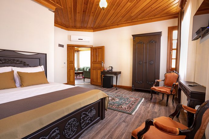 Imagen de la habitación del WOO Town Suites. Foto 8